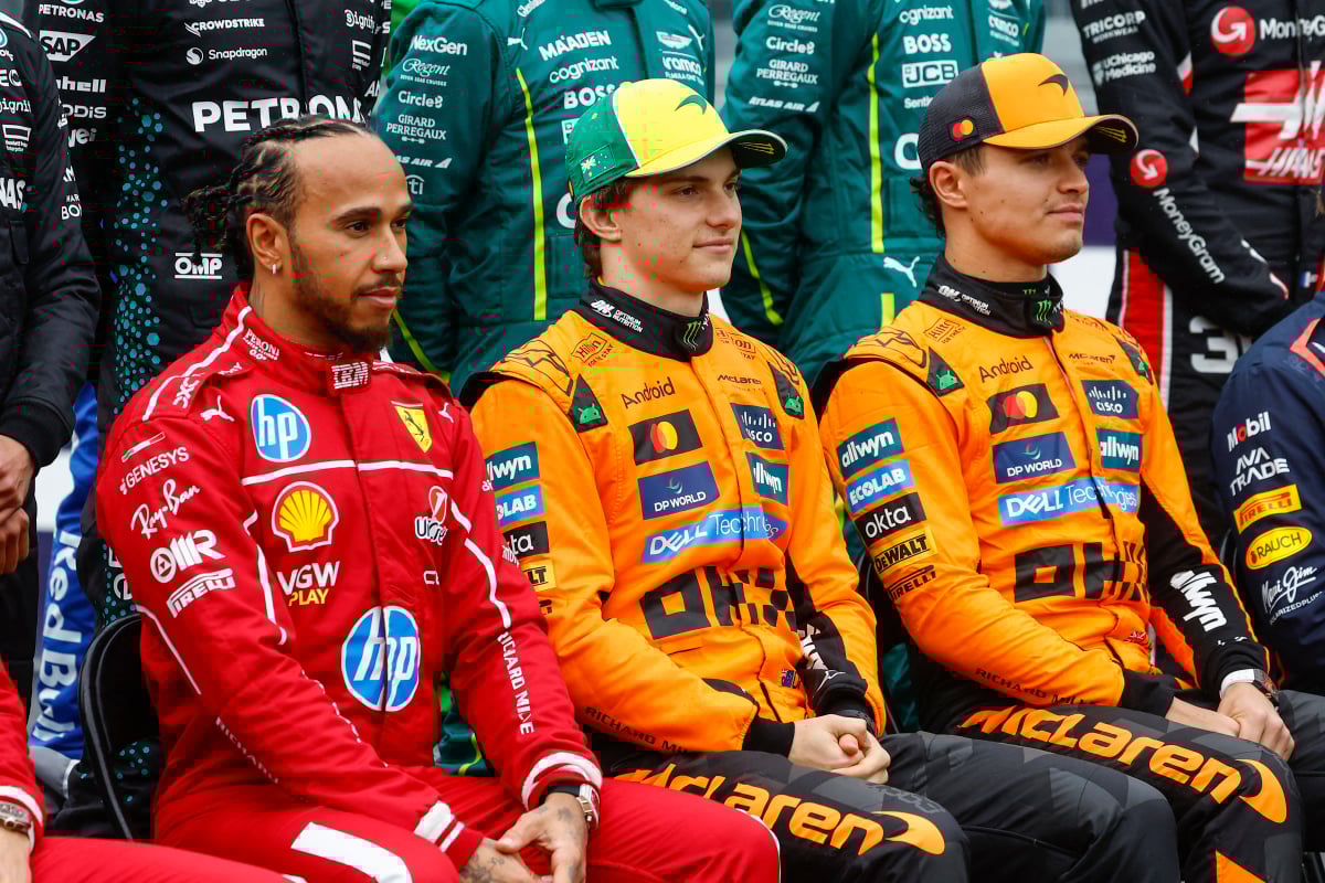 Lewis Hamilton, Oscar Piastri, Lando Norris sit next to each other at the Australian Grand Prix